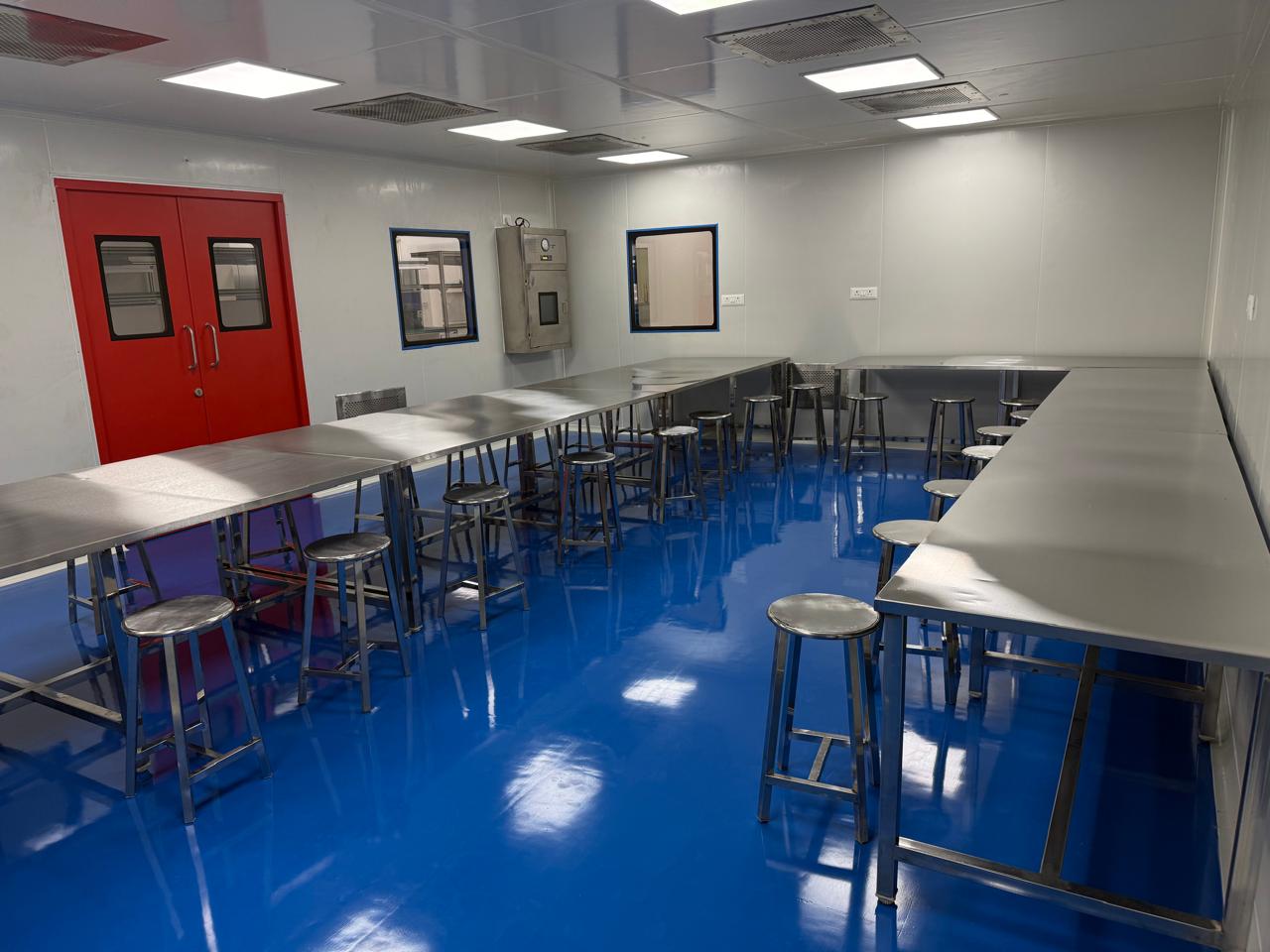 Finished cleanroom interior with stainless steel workstations