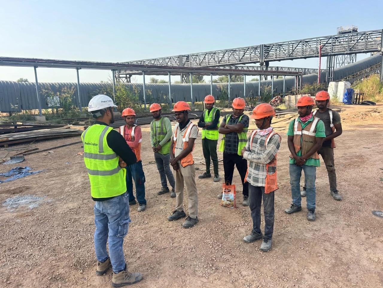 Prestro Creation site team in safety equipment